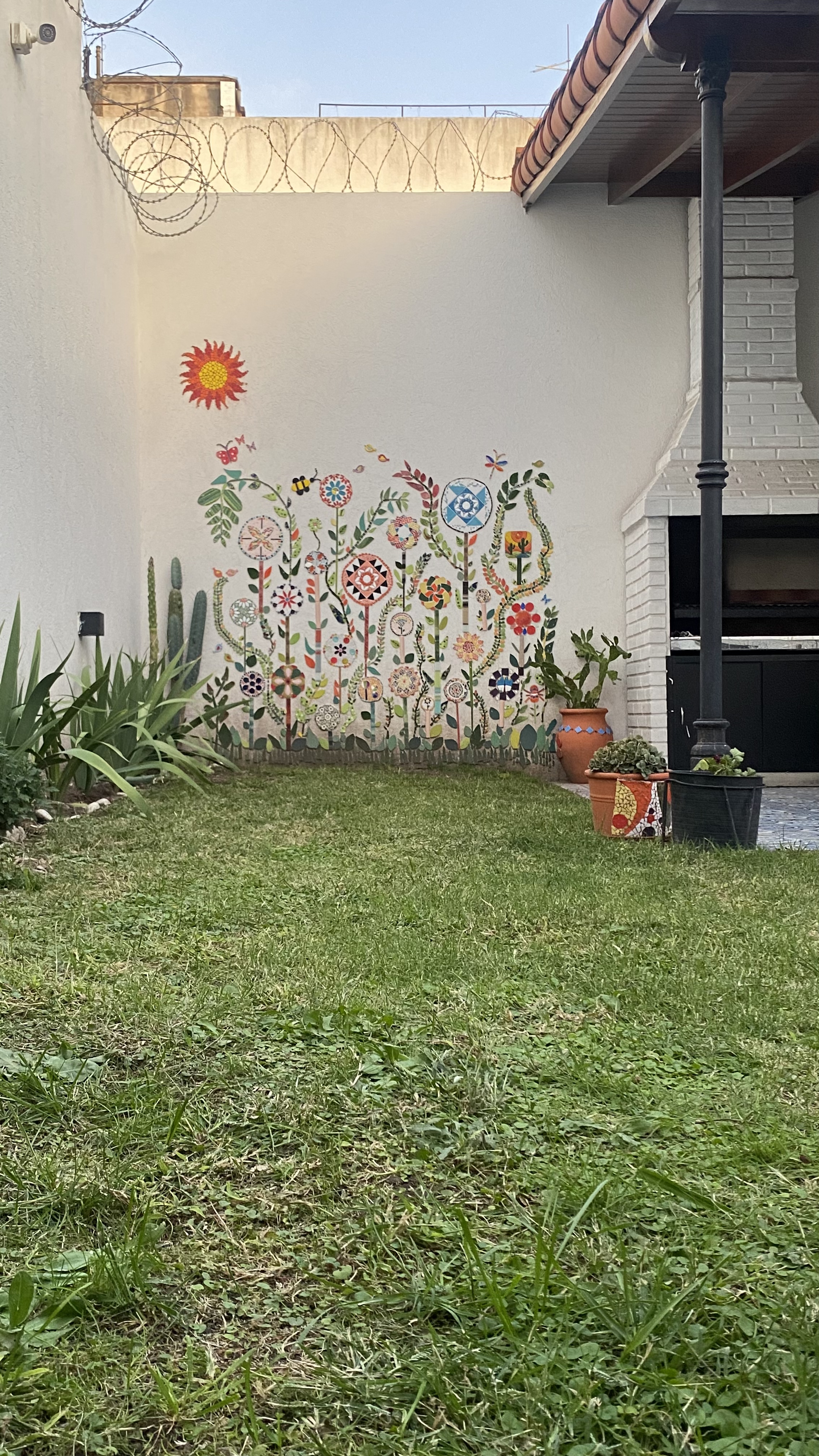 Mural jardín en mosaico